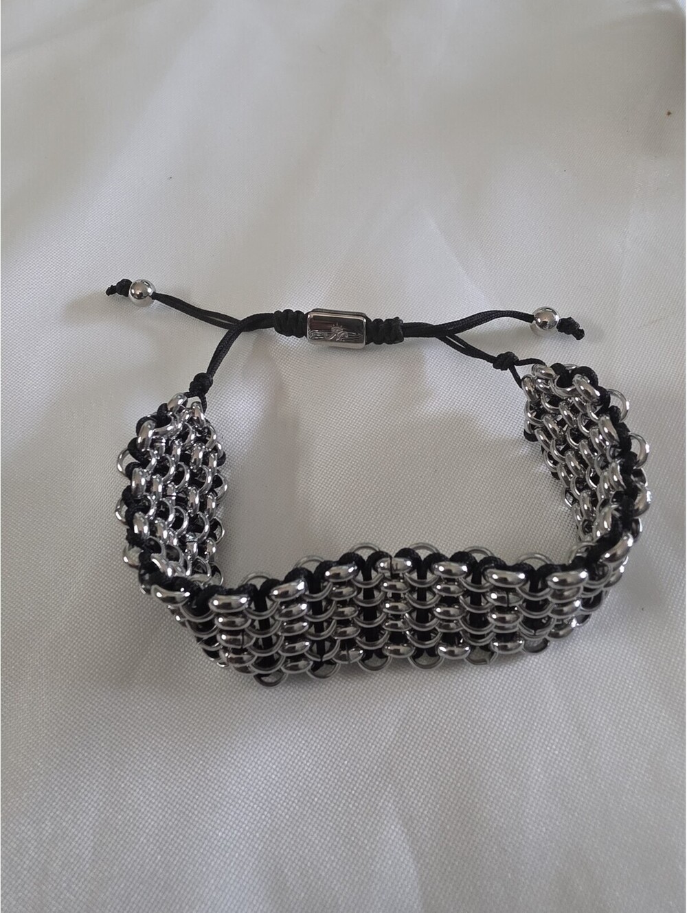 Nogu Silvertone And Black Cord Adjustable Bracelet